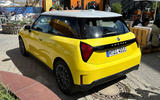 Mini Cooper Electric 2024 yellow rear quarter
