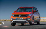 Volkswagen T-Cross front three quarters on the road