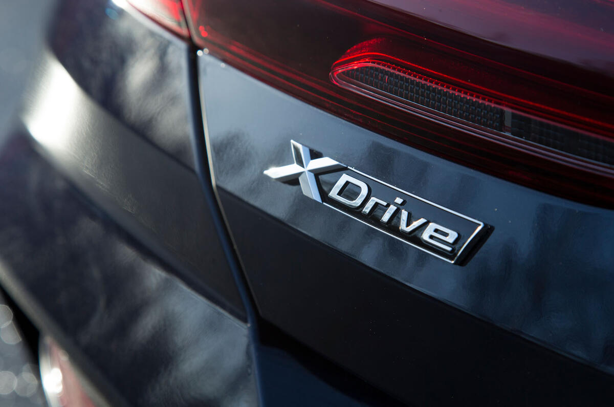 BMW 8 Series Coupé 2019 road test review - Xdrive badge