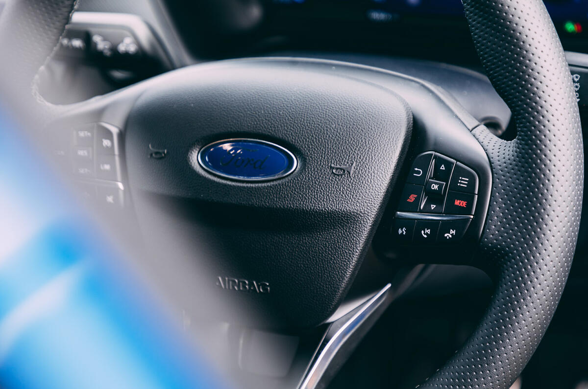 15 Ford Puma ST 2021 road test review steering wheel
