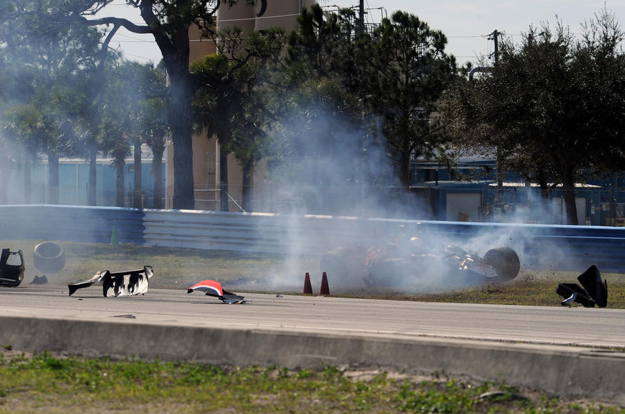 Racer unhurt in huge crash - pics