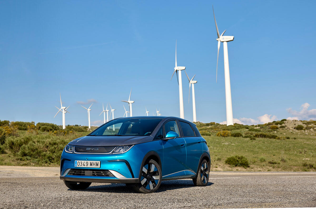 17 BYD Dolphin FD 2023 front static with wind turbines