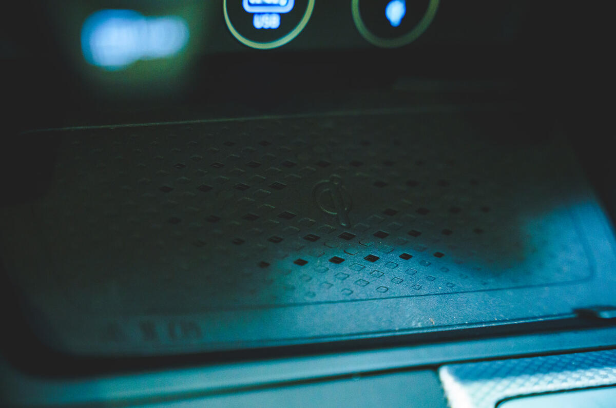 23 Genesis G70 2021 road test review wireless phone charging