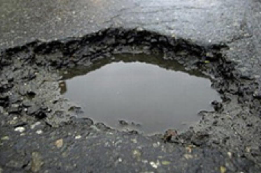 Council: 'Potholes calm traffic'