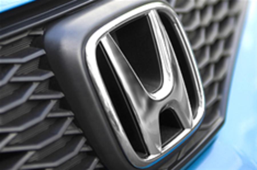 Honda suspends business travel
