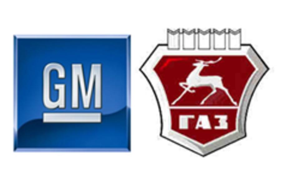 Russian car maker buys share in GM