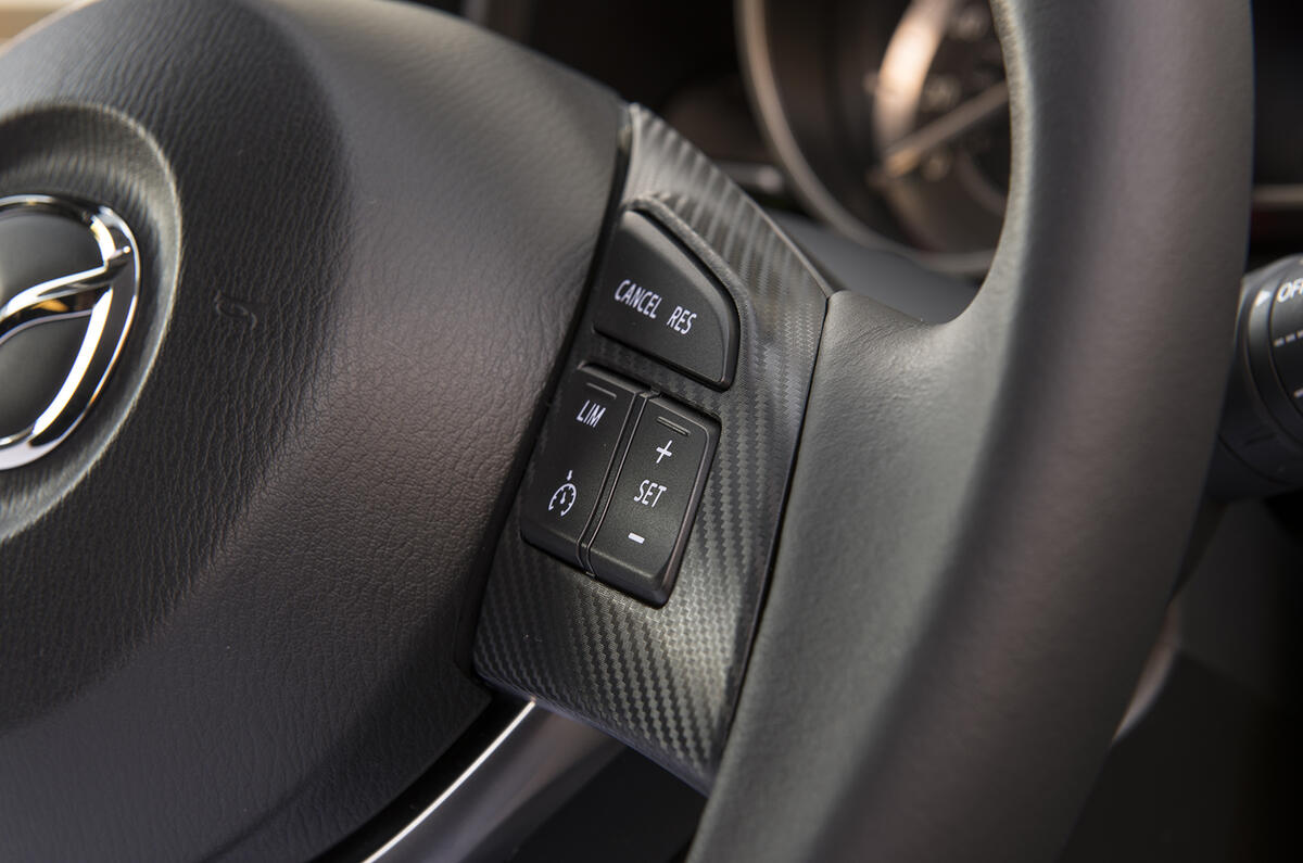 Mazda 3 steering wheel buttons