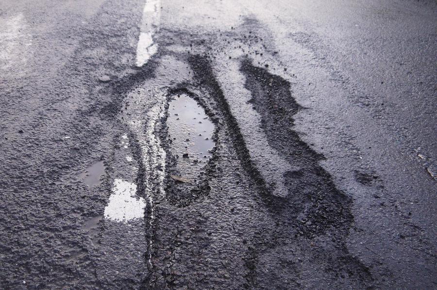Government pledges an extra £140m for pothole repairs