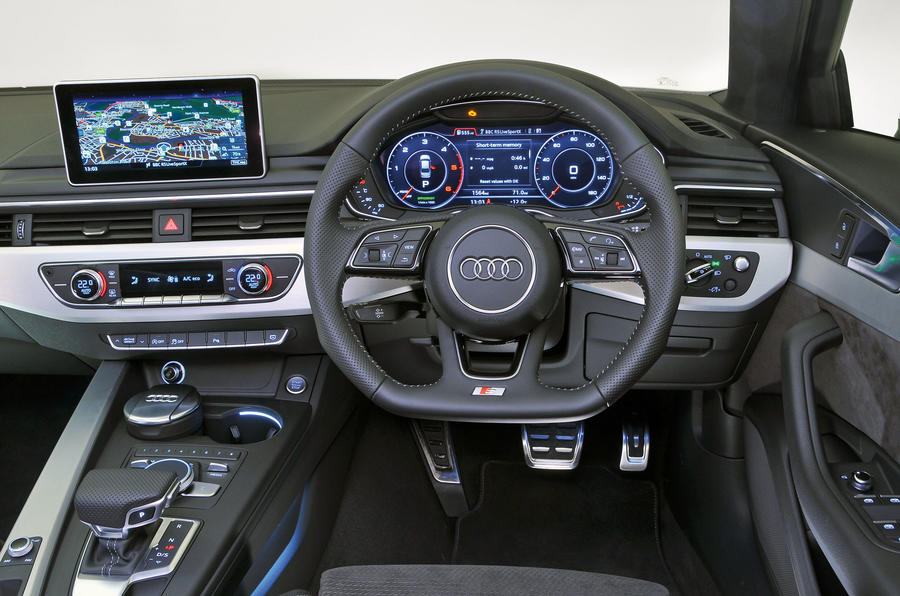 mass matrix Young lady Audi A4 interior | Autocar