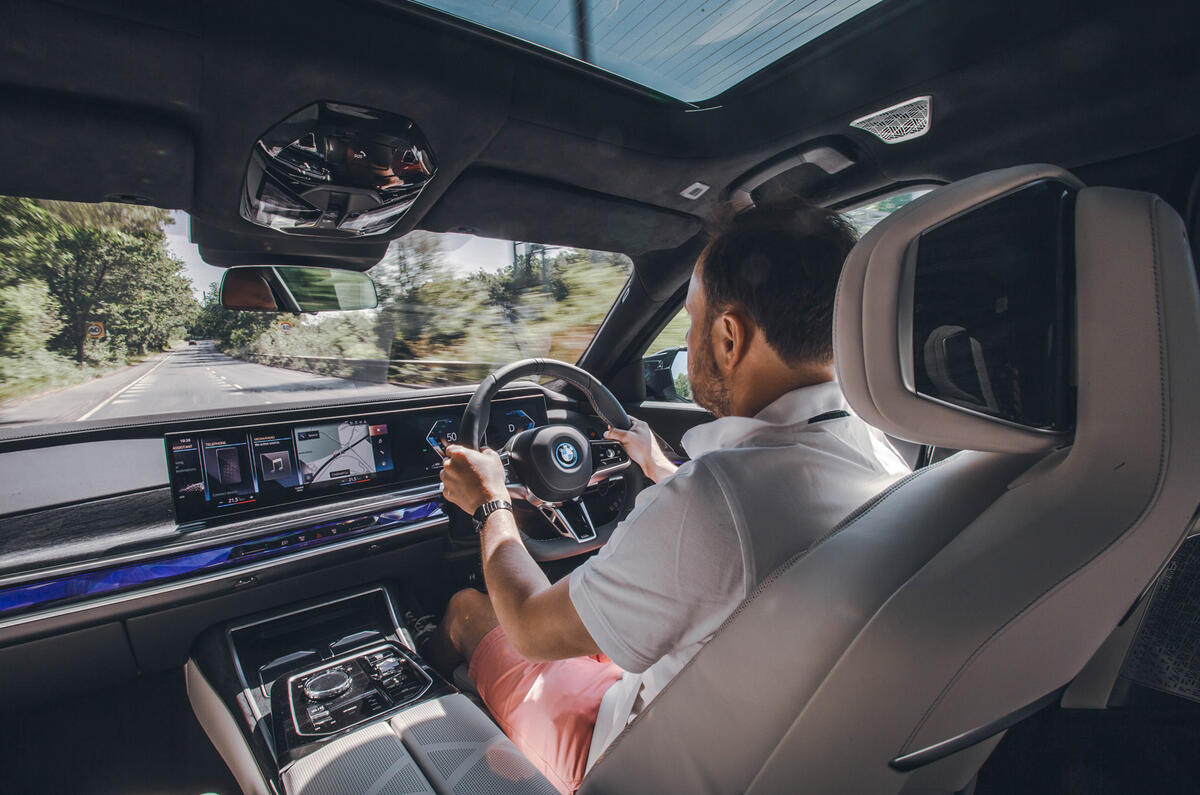 BMW M760e front seats driver view