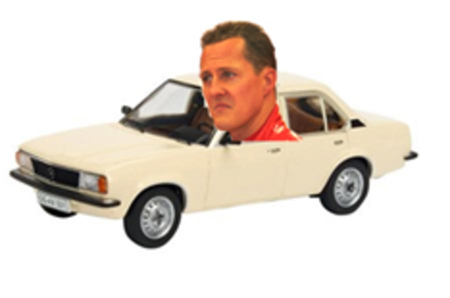 F1 star Schumacher turns airport cabbie