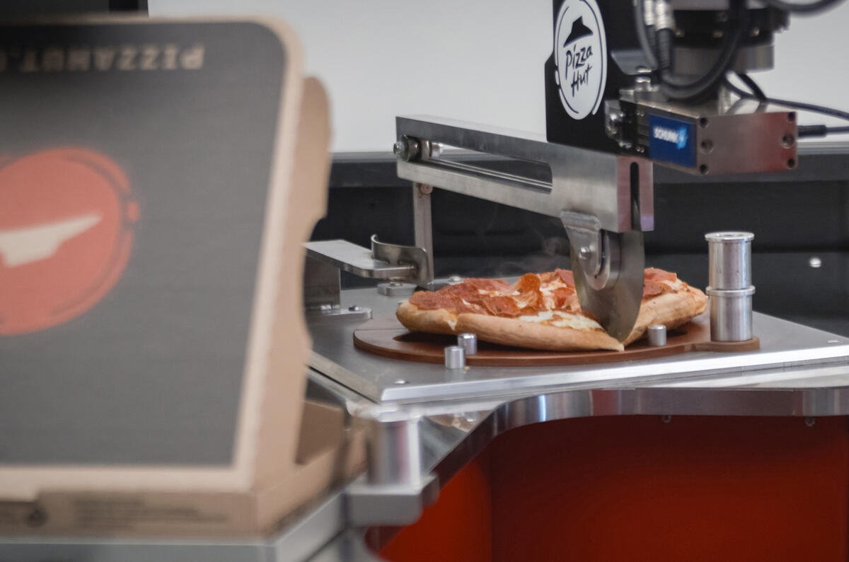 Toyota reveals hydrogenpowered pizzaproducing pickup Autocar