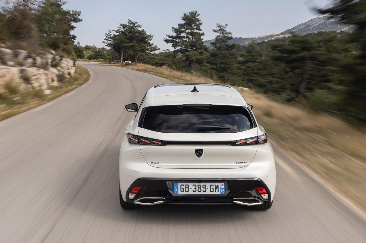 10 Peugeot 308 Hybrid 225 2021 LHD review on road rear