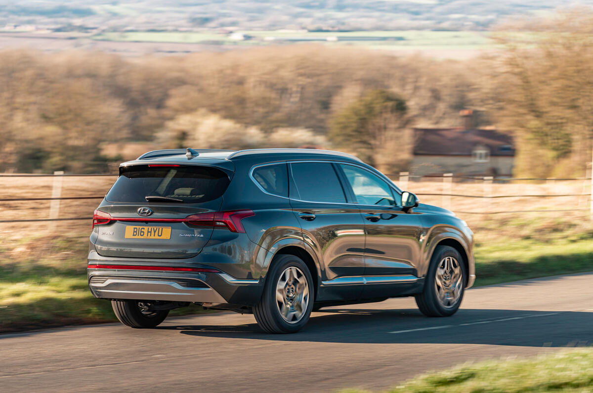 13 Hyundai Santa Fe PHEV 2021 UK FD on road rear