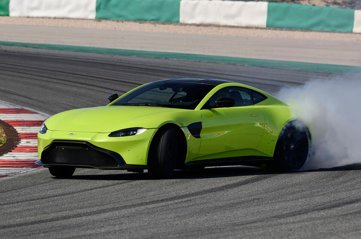 Aston Martin Vantage smoking tyres front right