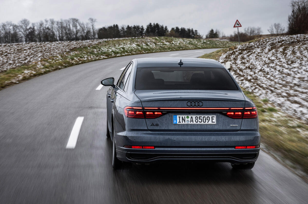 18 Audi A8 TFSIe 2022 first drive review on road rear