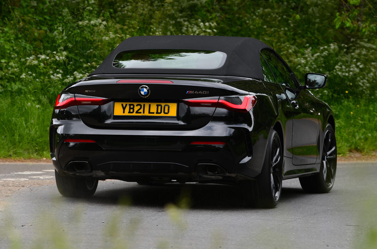 18 BMW 4 Series M440i Convertible 2021 UK FD on road roof up rear