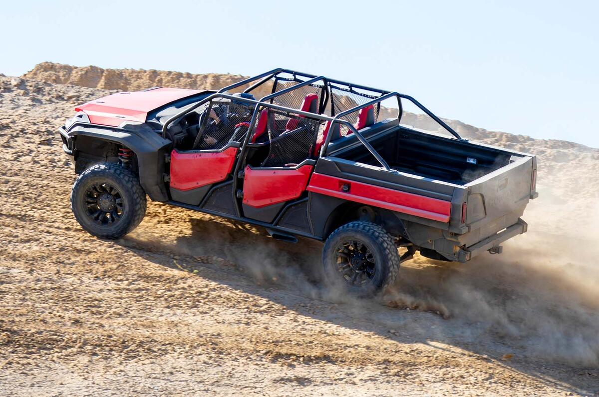 Honda Rugged Open Air Vehicle concept being driven off-road