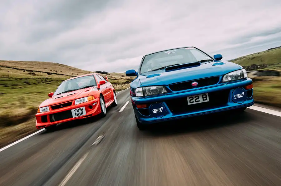 Rally Legends Twin Test Mitsubishi Lancer Evo Vi Makinen Vs Subaru Impreza 22b Autocar