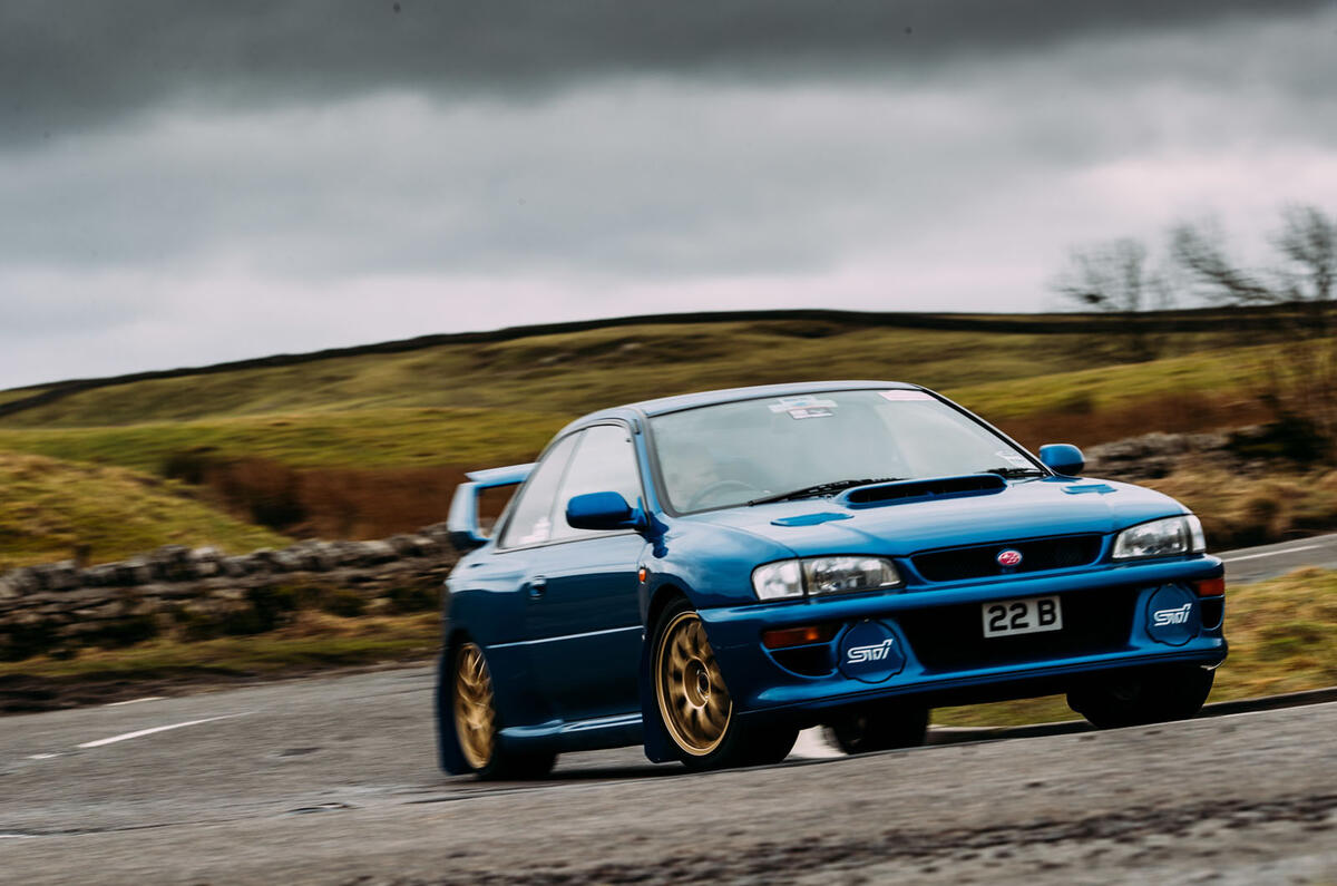 Rally Legends Twin Test Mitsubishi Lancer Evo Vi Makinen Vs Subaru Impreza 22b Autocar