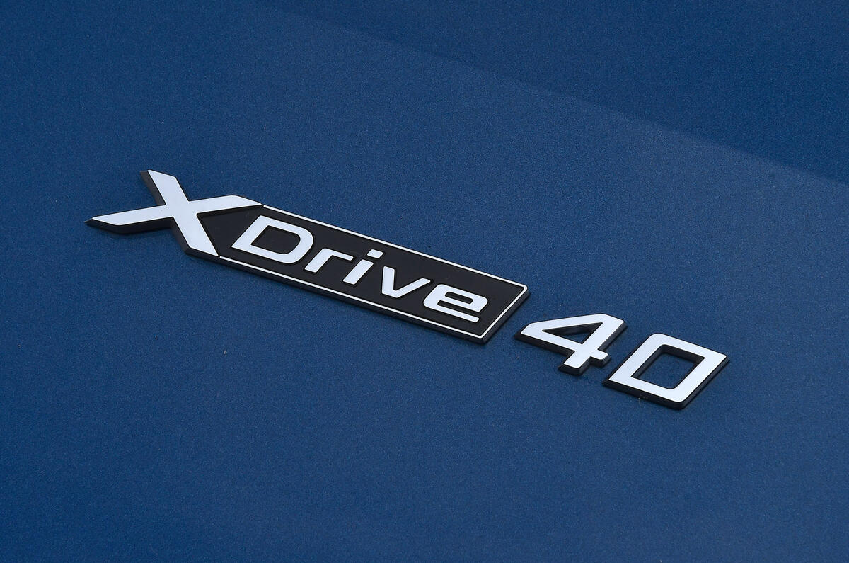 7 BMW iX xDrive40 2021 UK first drive review rear badge