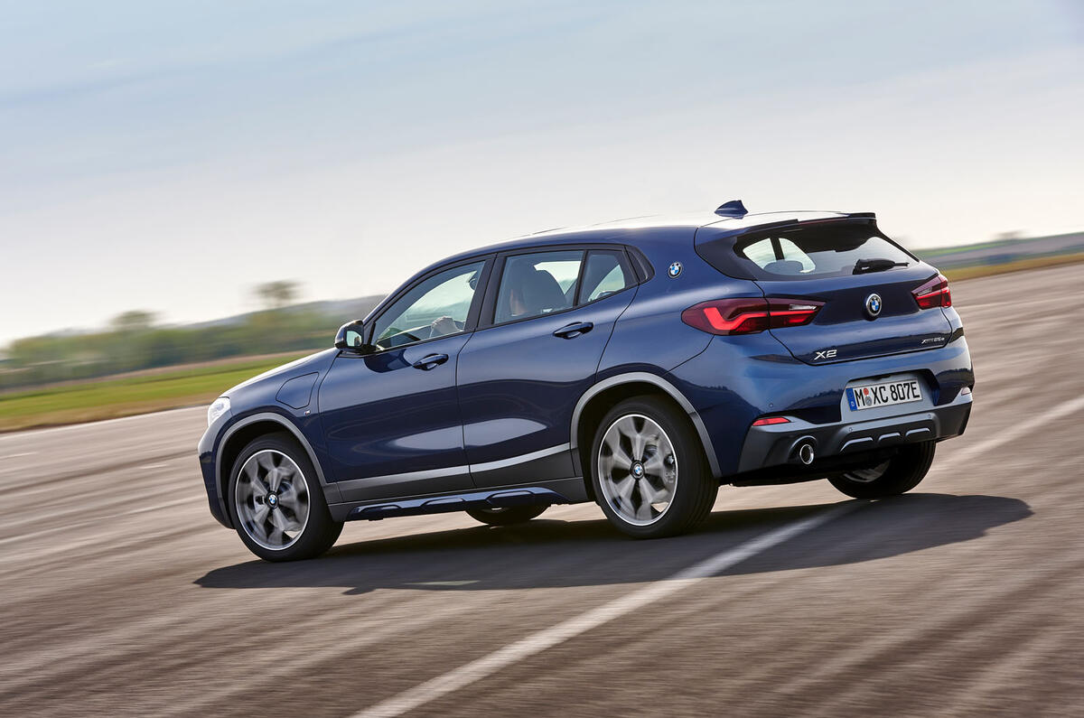 BMW X2 plug-in hybrid official press images - on the road rear