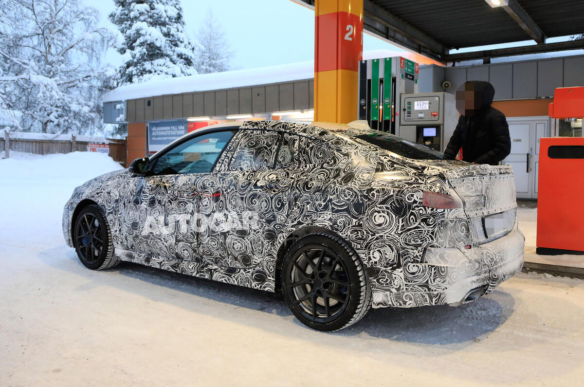 BMW 2 Series camouflage winter testing 2019 - petrol station rear