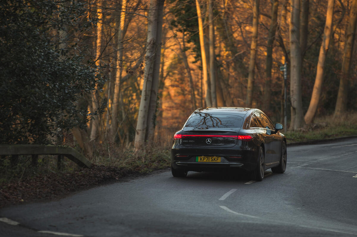 92 BMW iX vs Mercedes EQS 2022 EQS on road rear