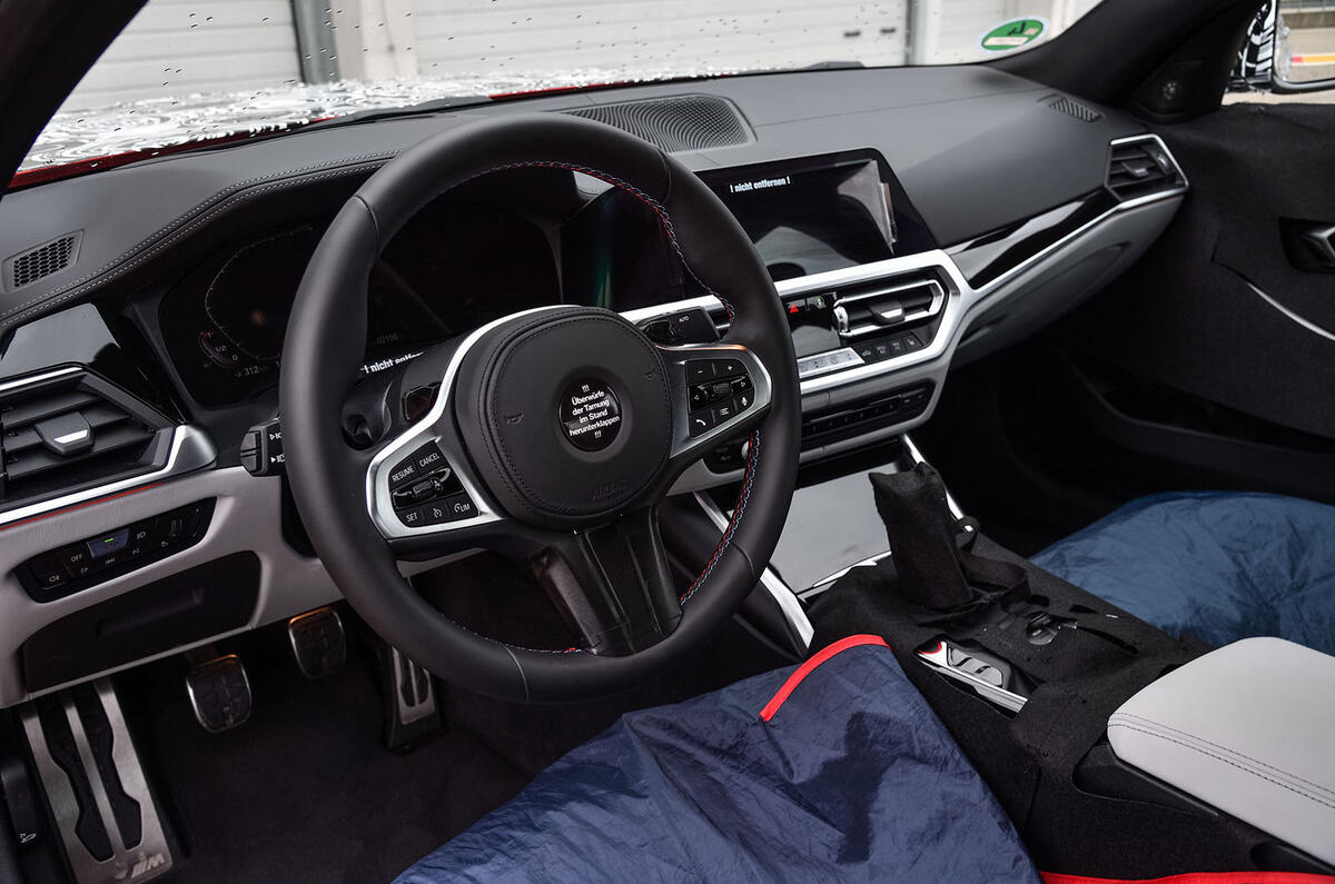 92-bmw-m3-prototype-drive-2020-camo-steering-wheel.jpg