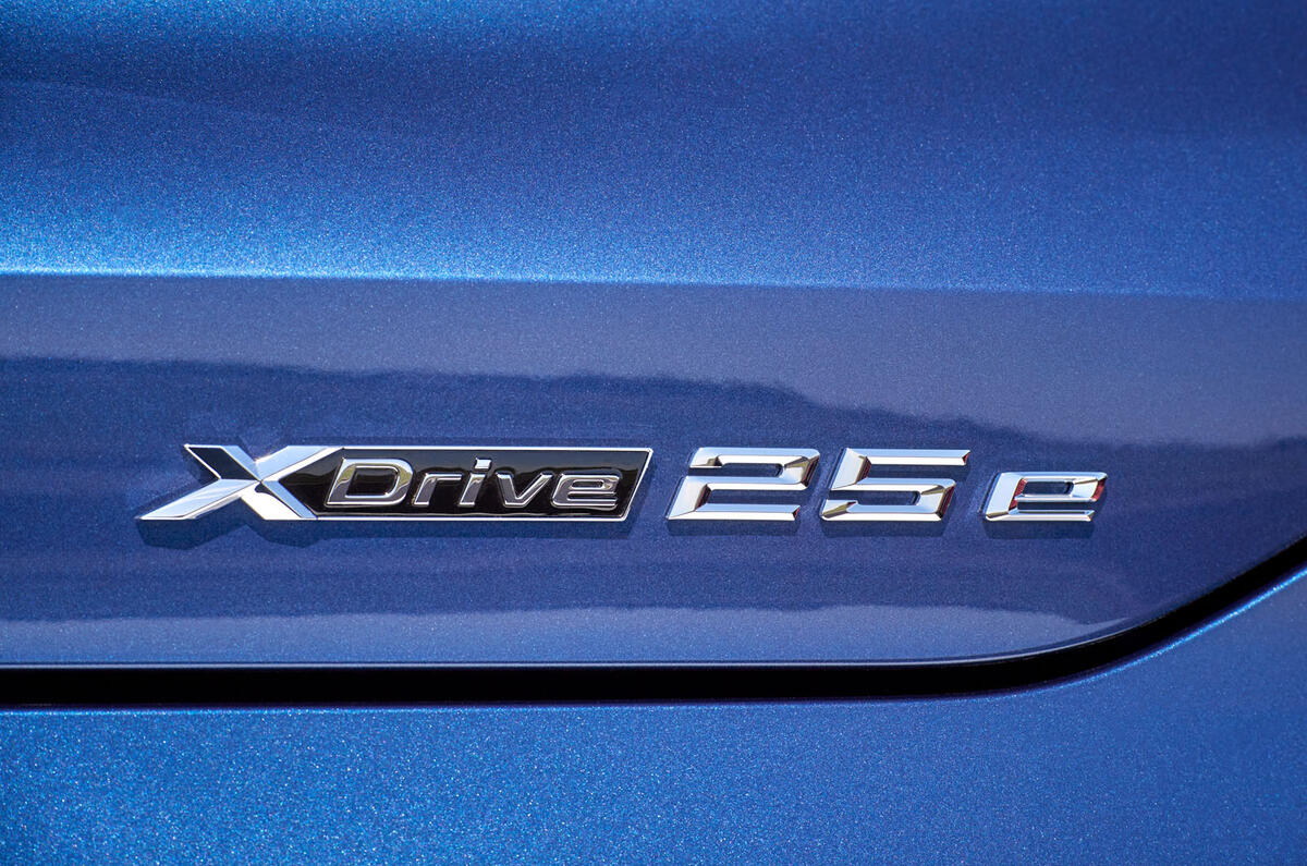 BMW X2 plug-in hybrid official press images - badge