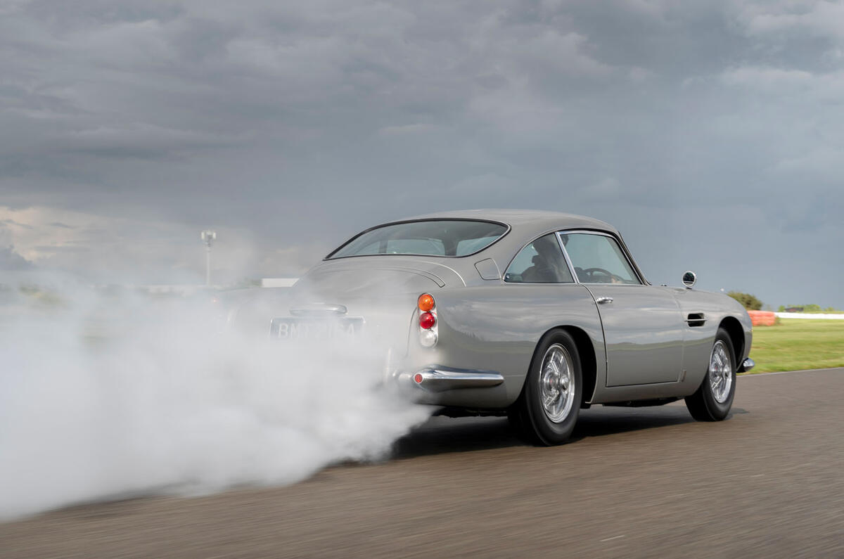 98-aston-martin-db5-goldfinger-continuation-1st-built-smoke.jpg?itok=PXDoB_l0