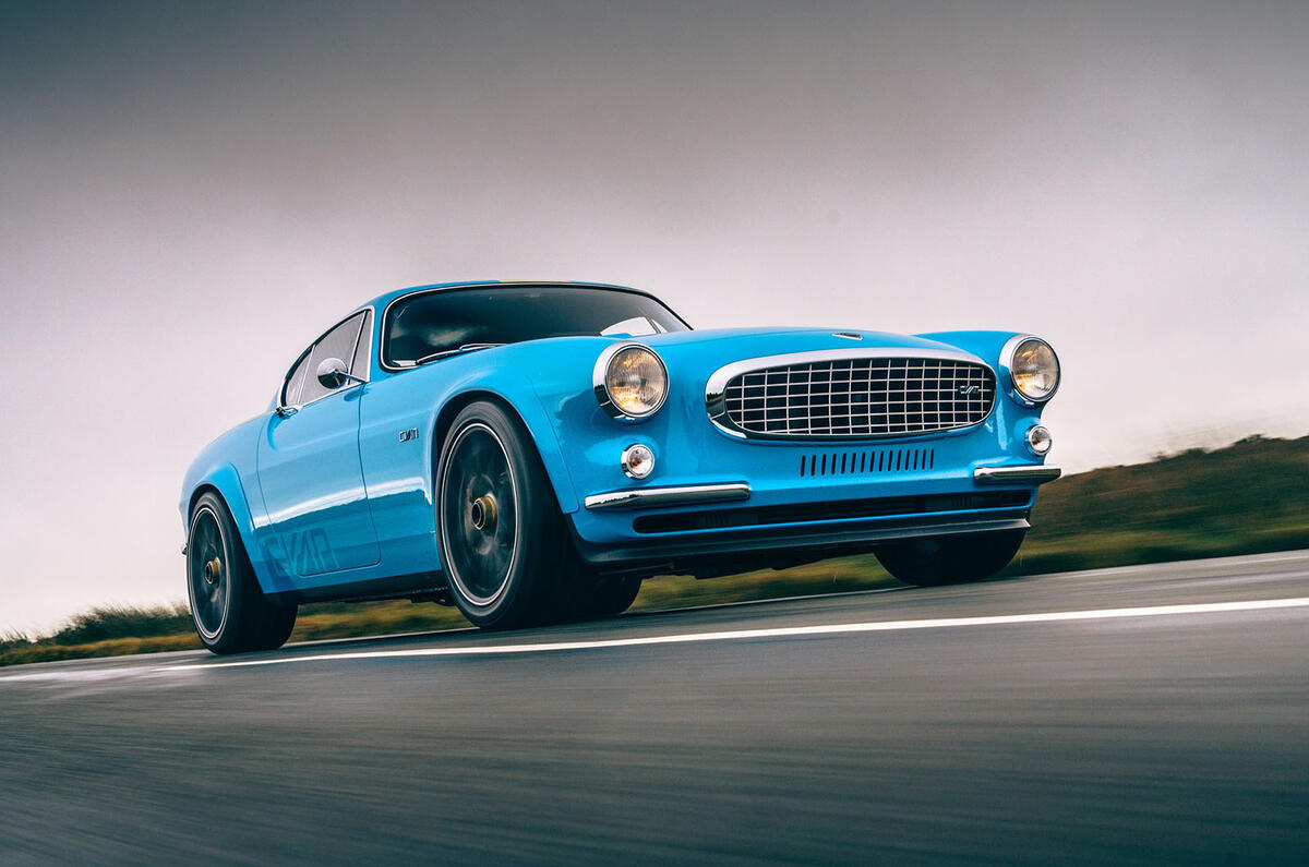 Cyan Volvo P1800 drive - hero front