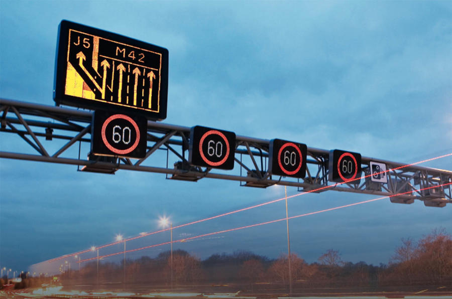 Speed limit signs over M42 smart motorway