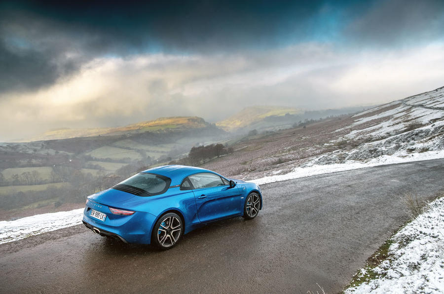 Alpine A110 parked on a mountain road - rear