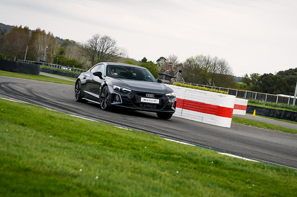 Out of the Chicane, quattro all-wheel-drive propels the Audi RS e-tron GT onto the straight