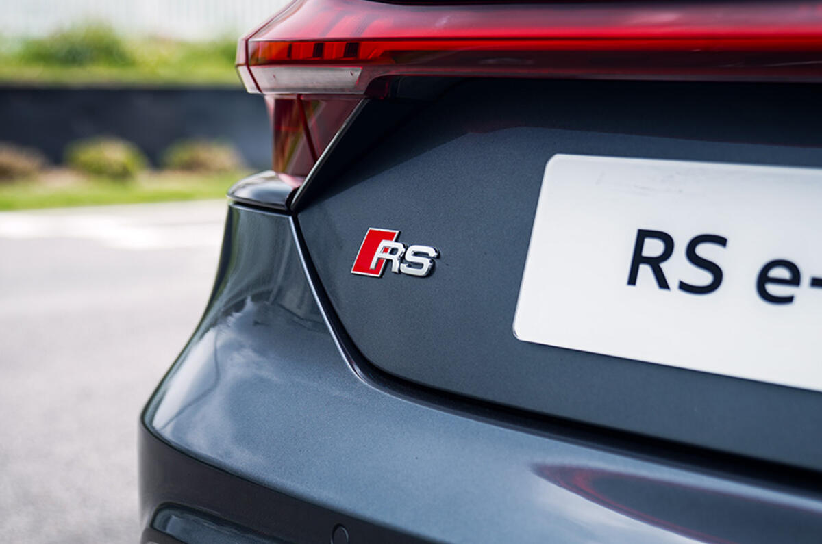 The RS badge indicates the race-bred DNA that underpins the Audi RS e-tron GT