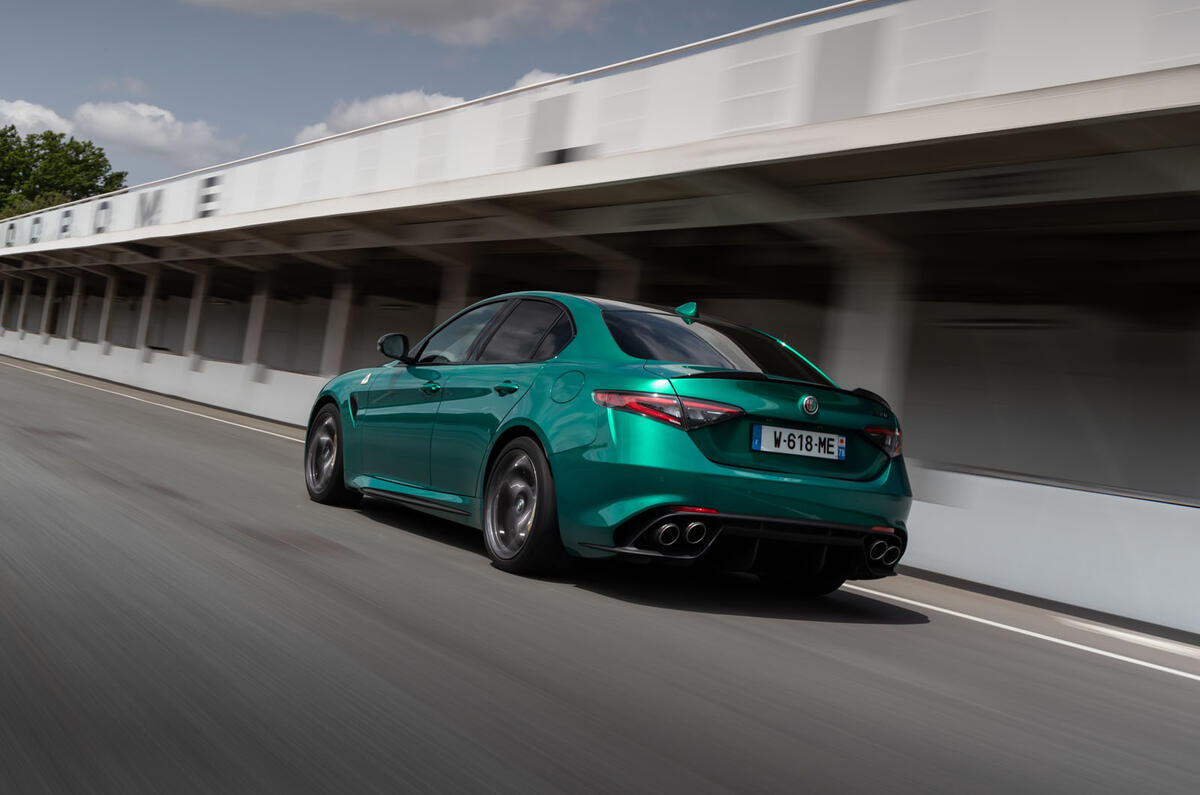 alfa romeo giulia quadrifoglio 100years review 03 tracking rear
