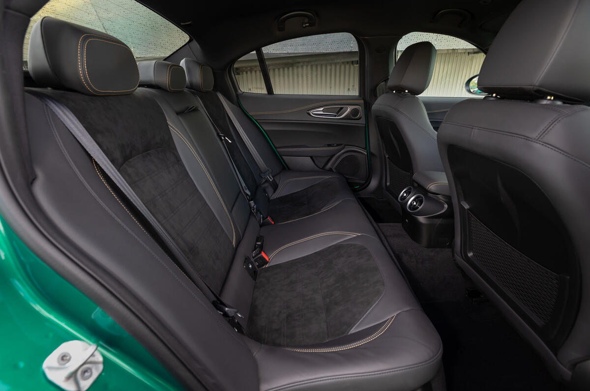 alfa romeo giulia quadrifoglio 100years review 11 seats rear