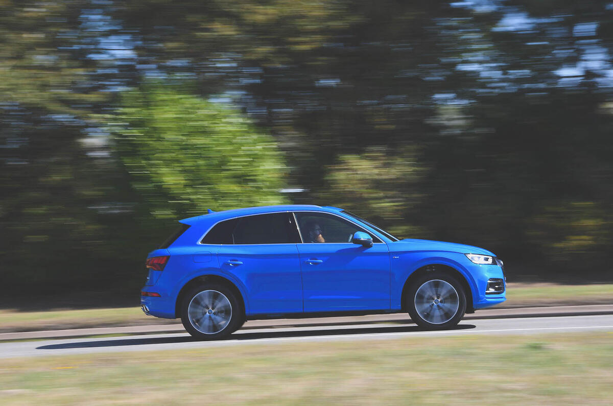 Audi Q5 55 TFSIe quattro side profile on the road
