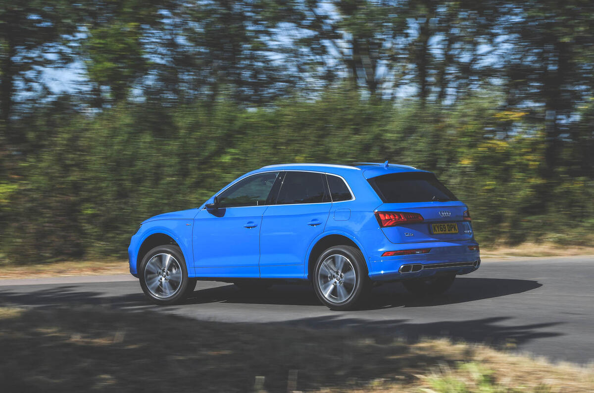 Audi Q5 55 TFSIe quattro rear side profile on the road