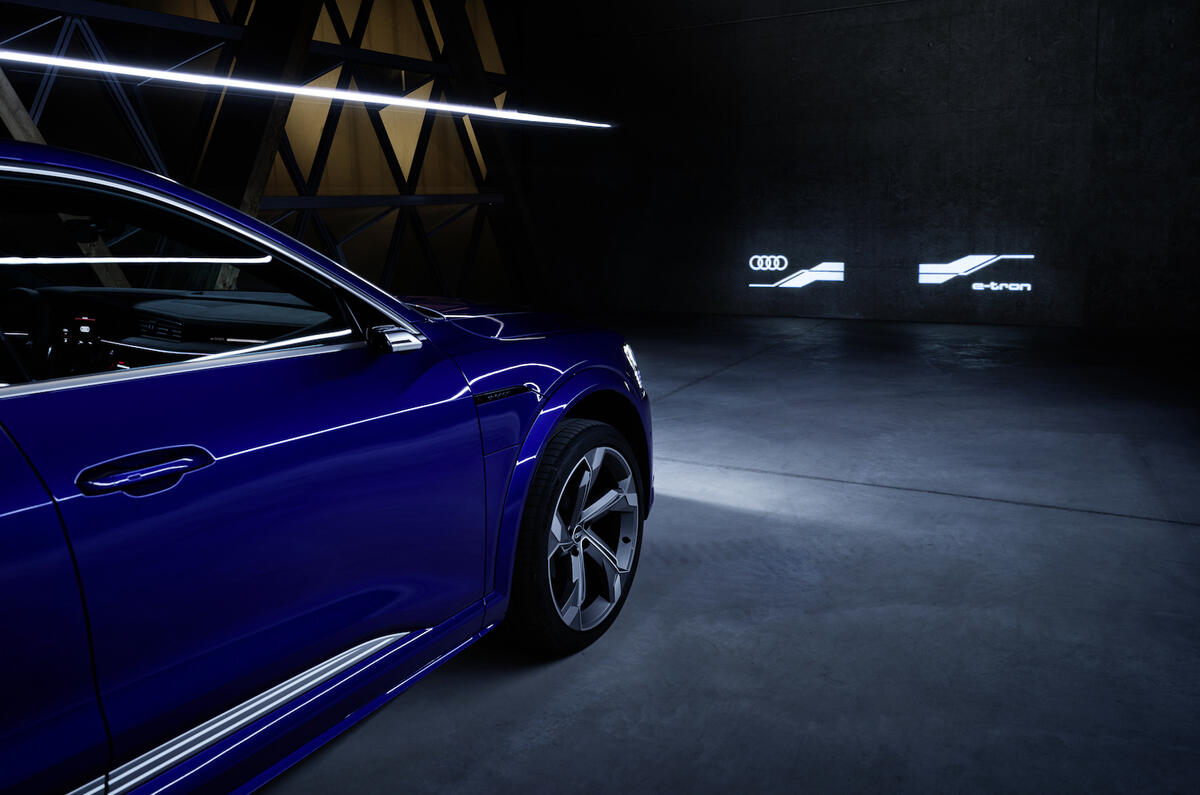 The Audi SQ8 e-tron's Digital Matrix LED headlights can also be used to project images, such as safety information