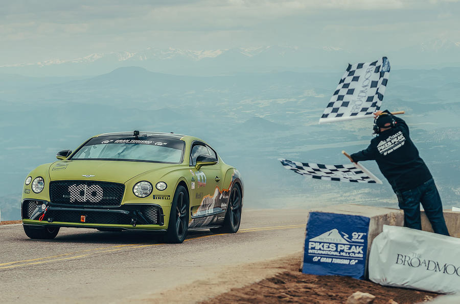 bentley continental gt driven by rhys millen crosses the line at pikes peak breaking the production car record