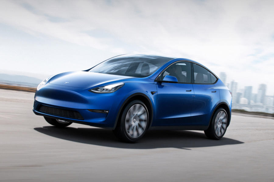 Tesla Model Y on the road blue