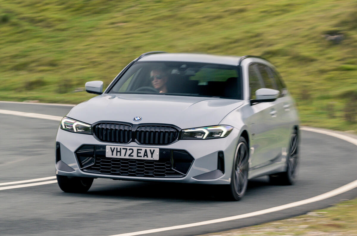 bmw 330e xdrive touring 05 cornering