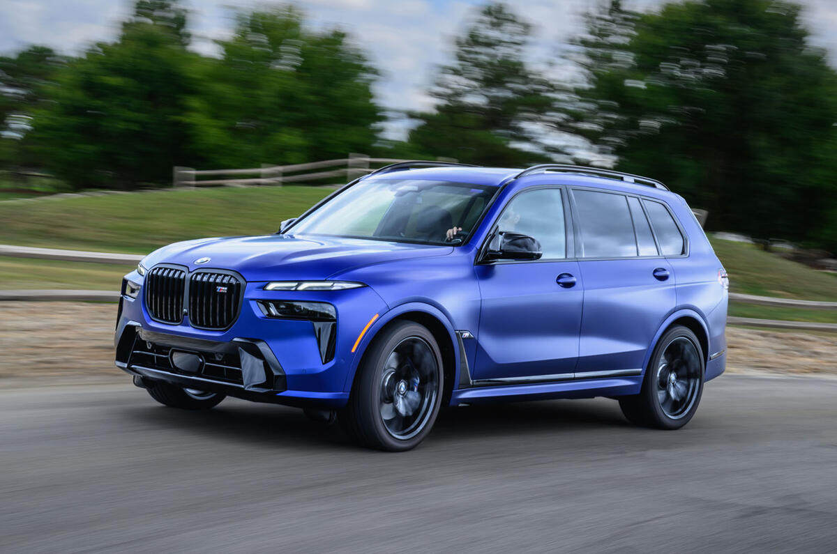 BMW X7 driving three quarters side