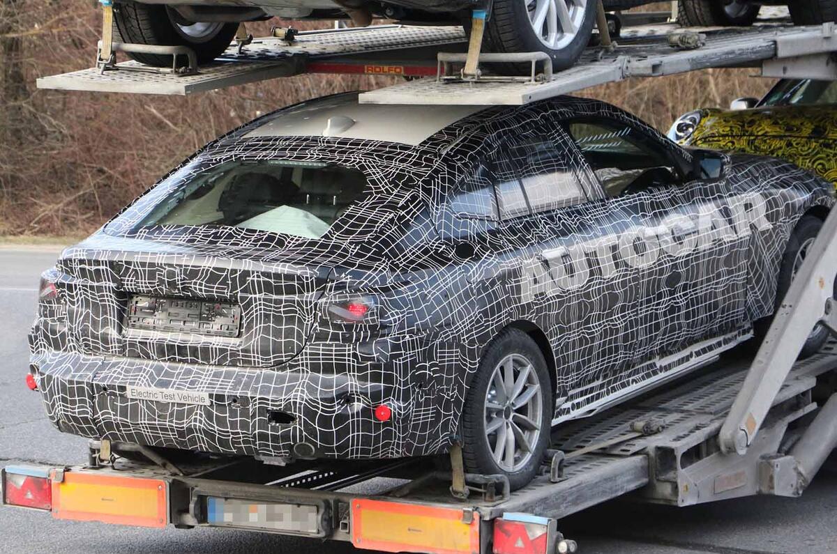 New Bmw I4 Tesla Model 3 Rival Spotted In Prototype Form