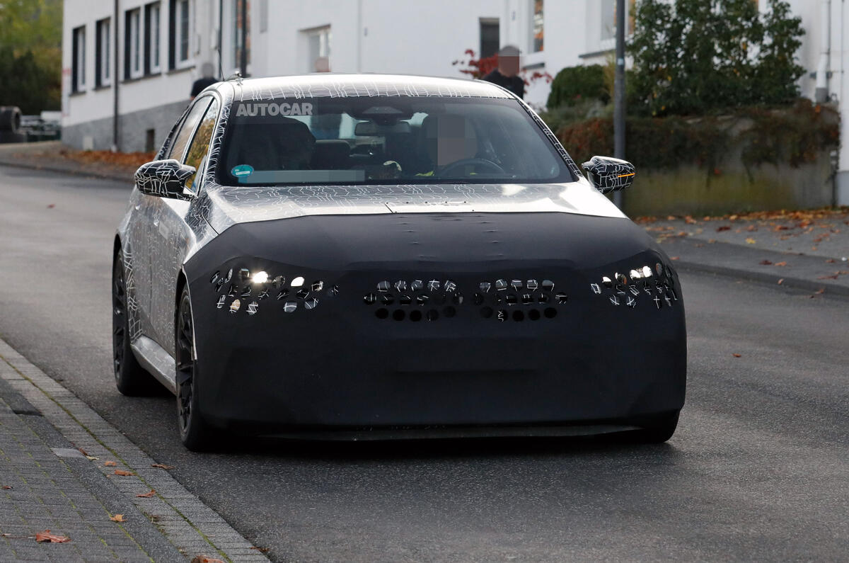 BMW M5 spied driving front 1