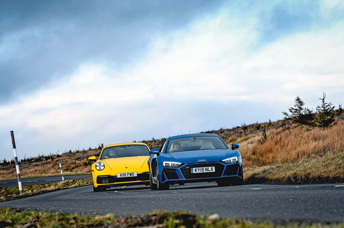 Revving the Evora’s supercharged V6 to 7000rpm is more exhilarating than what Porsche’s accomplished flat six can offer, but the R8’s lump hits hardest at 562bhp and 413lb ft