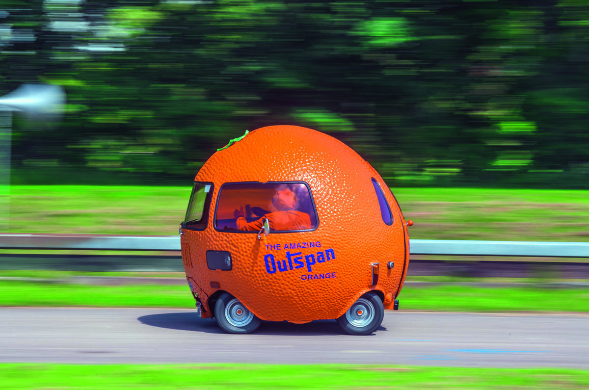 Strange fruit driving the Minibased Outspan Orange Autocar