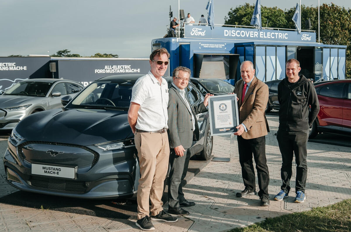 Ford's Tim Nicklin receives record certificate from left to right Mustang Mach E drivers Fergal McGrath Paul Clifton and Kevin Booker  1